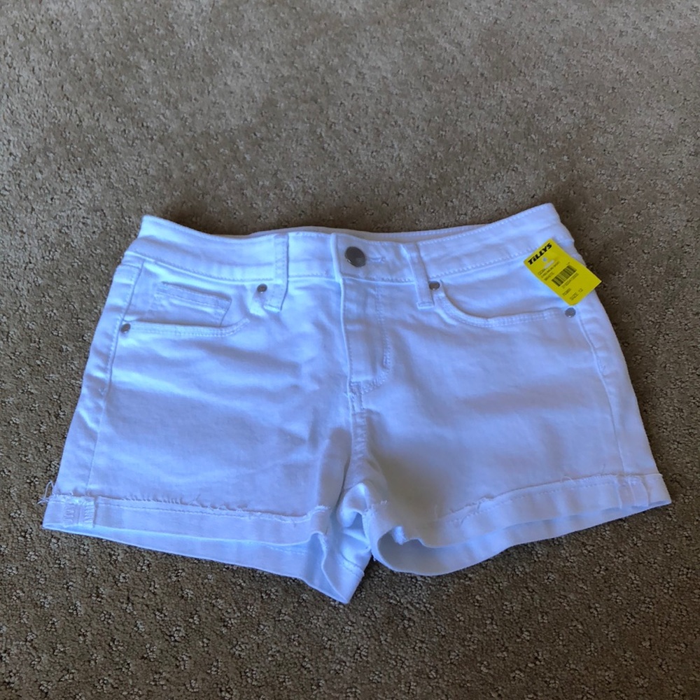 Girls white jean shorts. Brand new.
